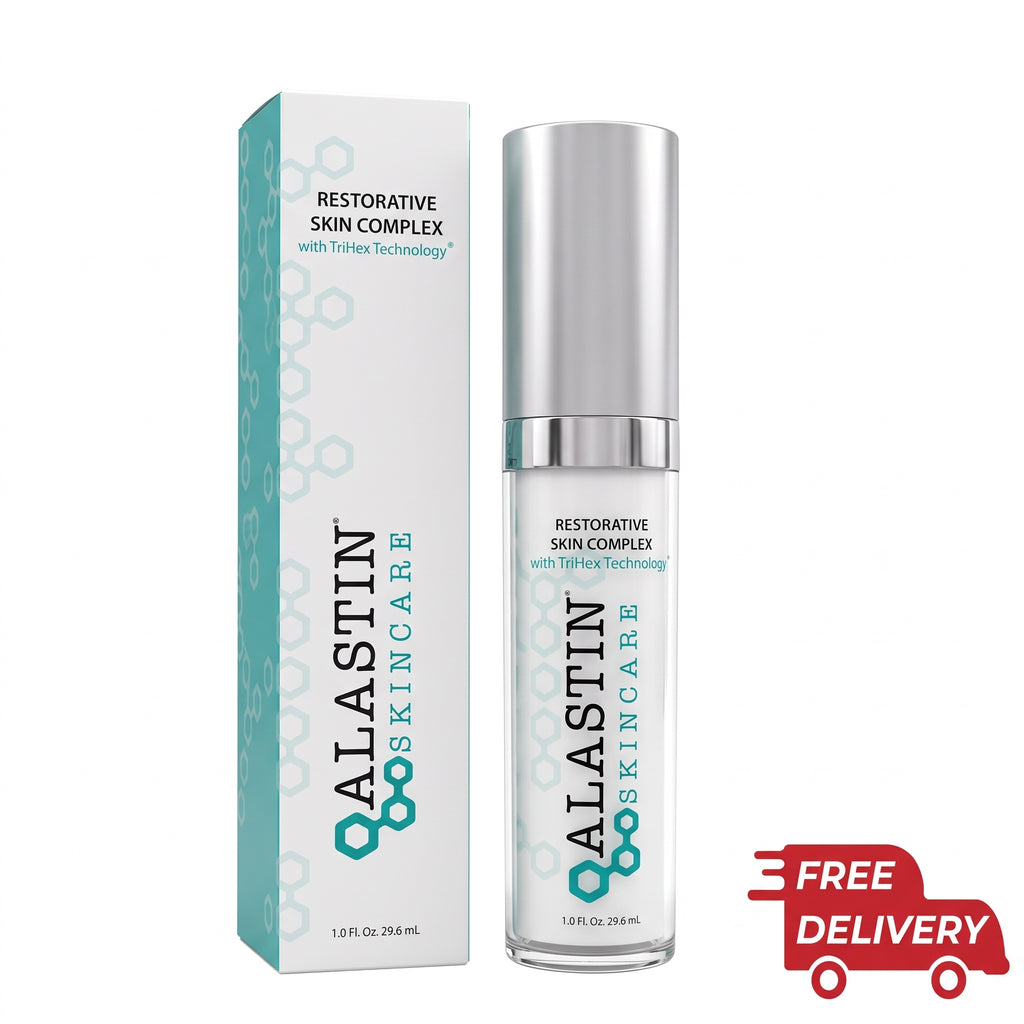 Alastin Skincare Restorative Skin Complex in a clear bottle with a silver cap, shown next to its white and teal packaging box. A red 'FREE DELIVERY' graphic is in the bottom right corner.