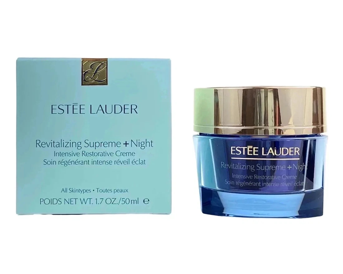 Estée Lauder Revitalizing Supreme + Night Intensive Repairing Cream in a light blue box next to its blue jar with a gold lid, on a white background.
