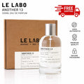 Le Labo Another 13 100ml Eau de Parfum bottle in clear glass with a silver cap, shown next to its brown kraft paper box. The image includes text overlays for 'LE LABO ANOTHER 13' and a 'FREE SHIPPING' graphic, along with quality badges on the right.
