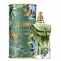 Jean Paul Gaultier perfume bottle and packaging with floral and dragon design.