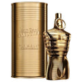 Gold perfume bottle and packaging with 'Jean Paul Gaultier' branding on a white background