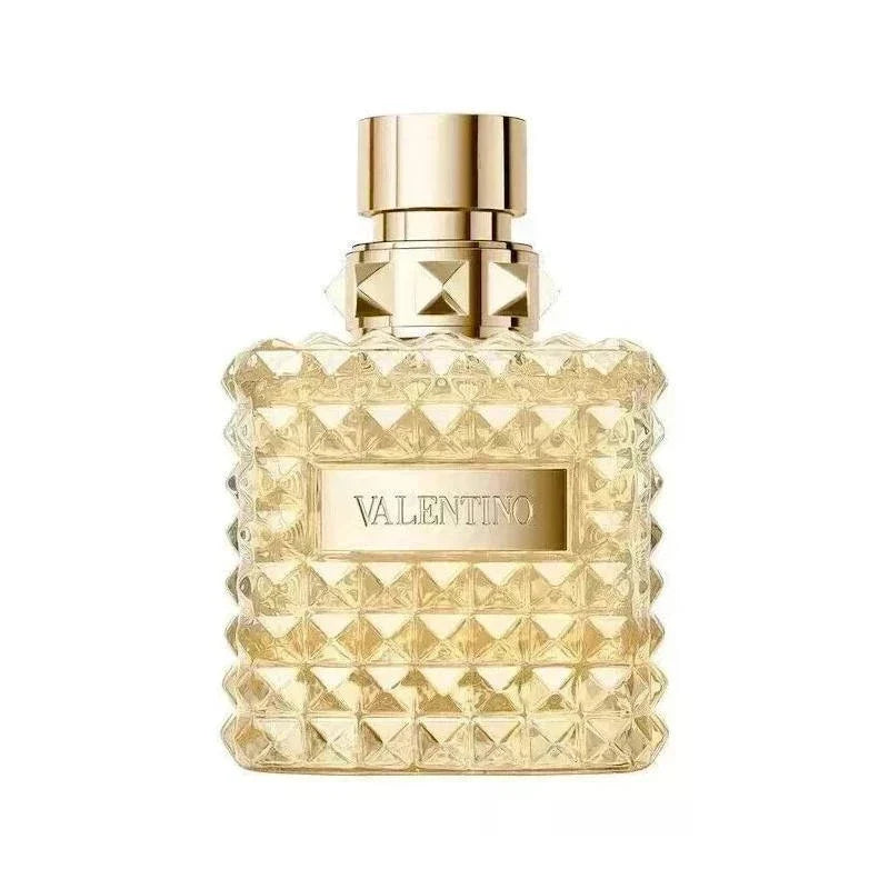 Gold perfume bottle with 'Valentino' branding on a white background