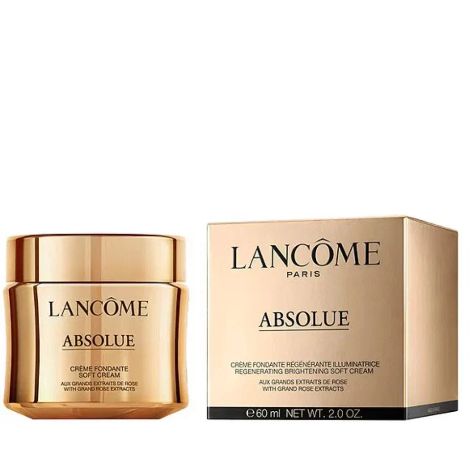 Lancôme Absolue Regenerating Brightening Soft Cream jar in a metallic gold container, shown next to its matching gold packaging box on a plain white background.